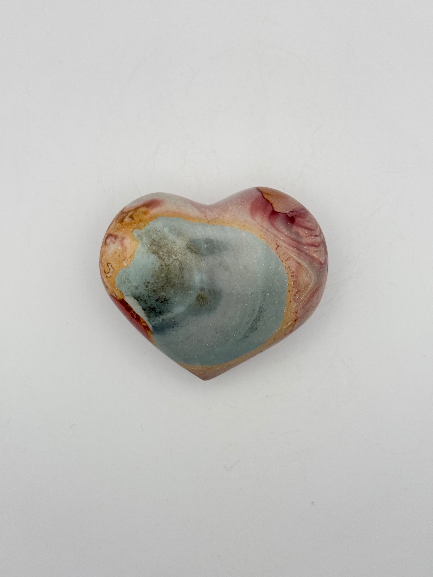 A polished polychrome jasper free from.