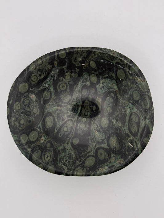 Polished kambaba jasper in the shape of a bowl.