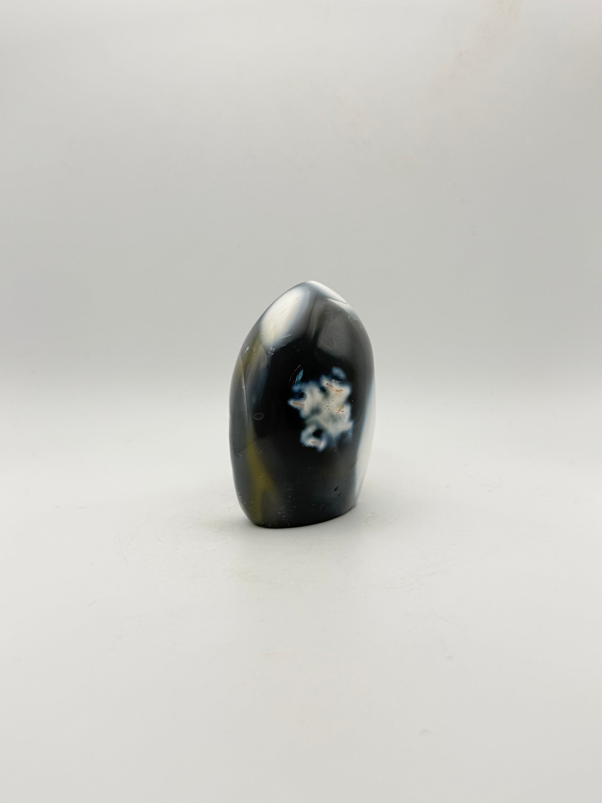 Polished orca agate free form.