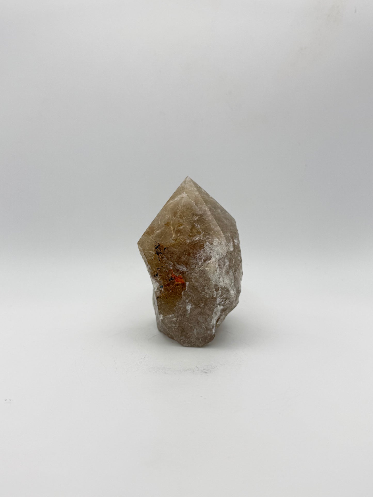 Smoky quartz tower with the top side polished and bottom natural.