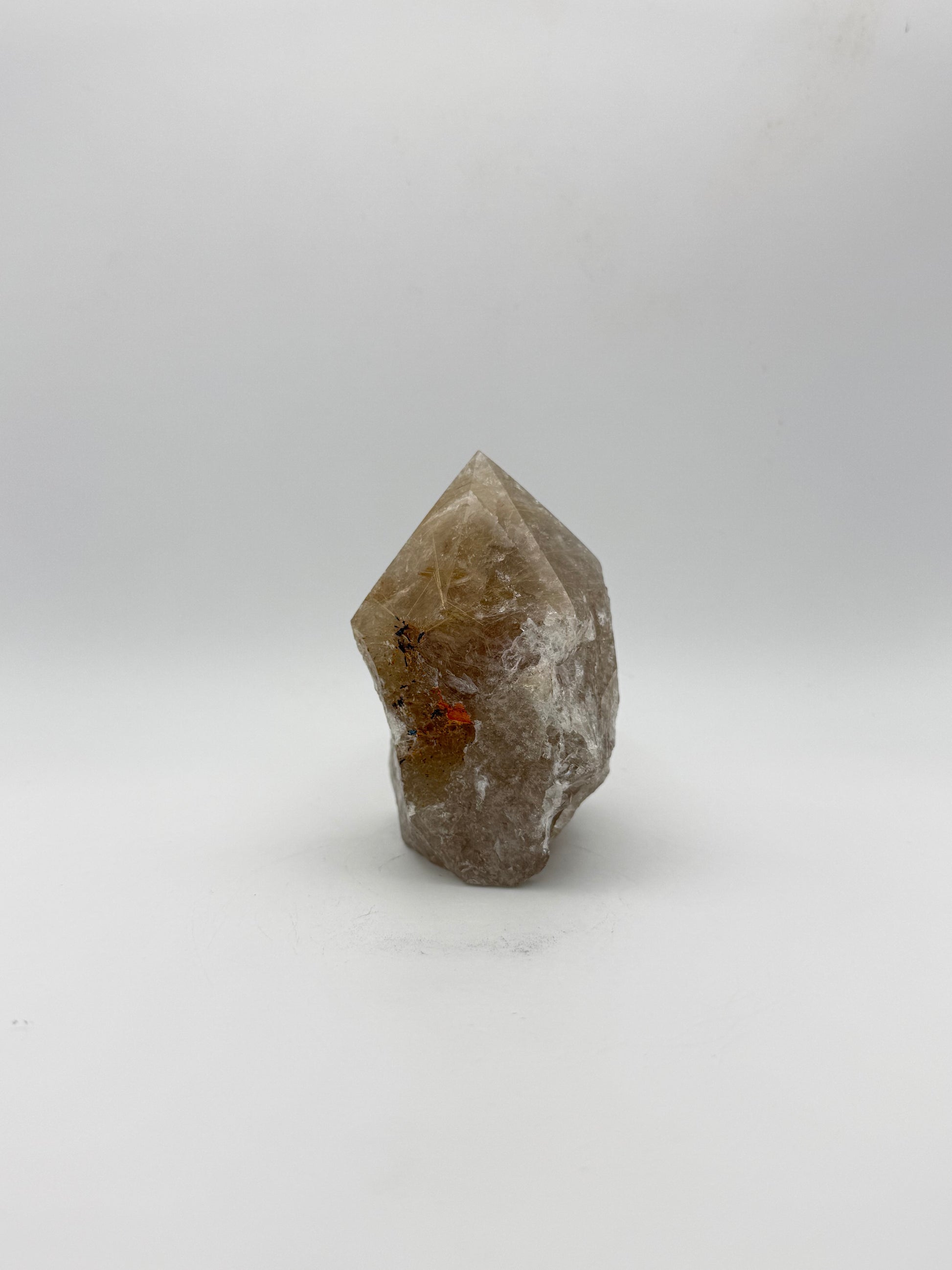 Smoky quartz tower with the top side polished and bottom natural.