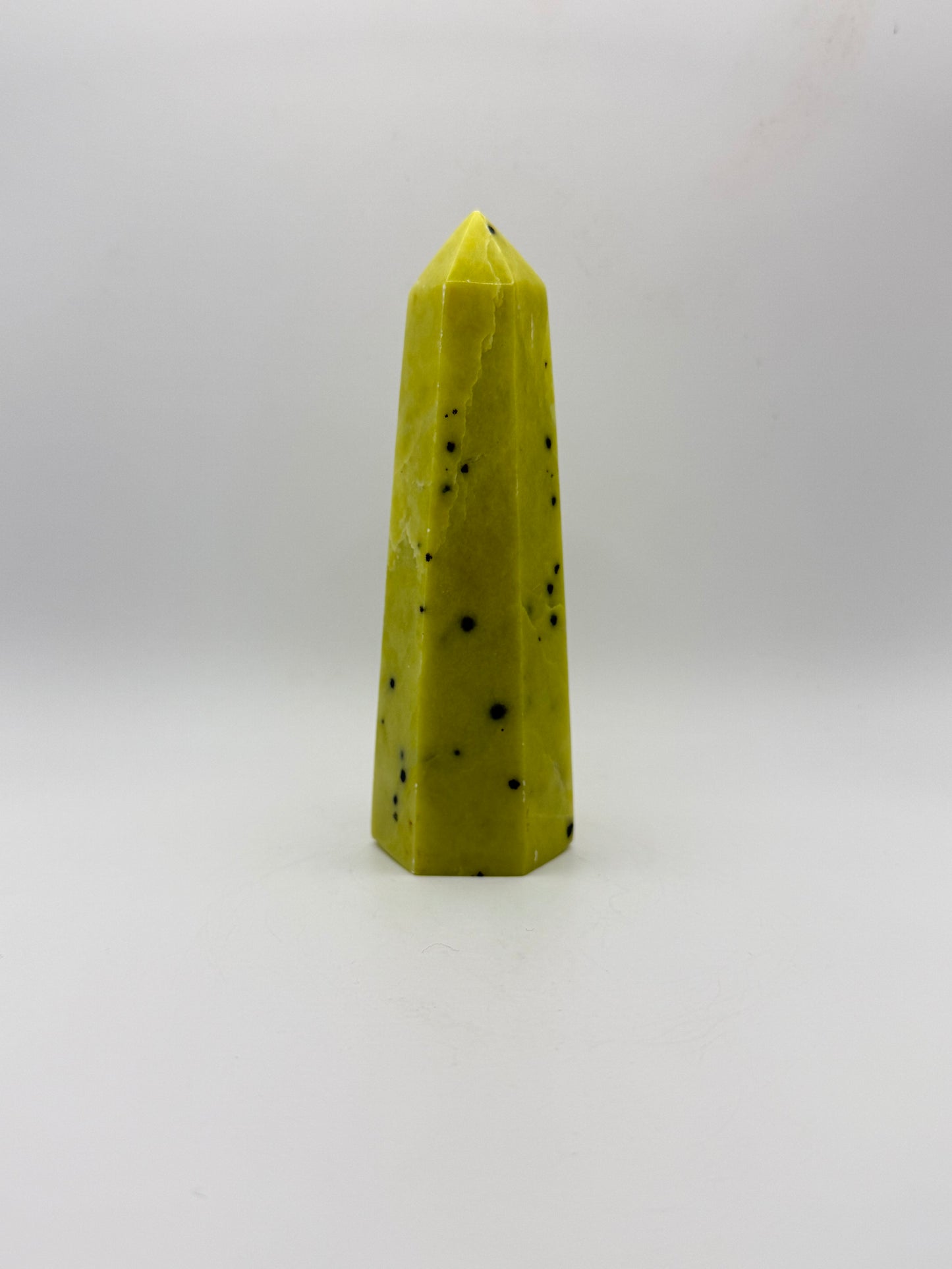 Polished healerite six sided tower.