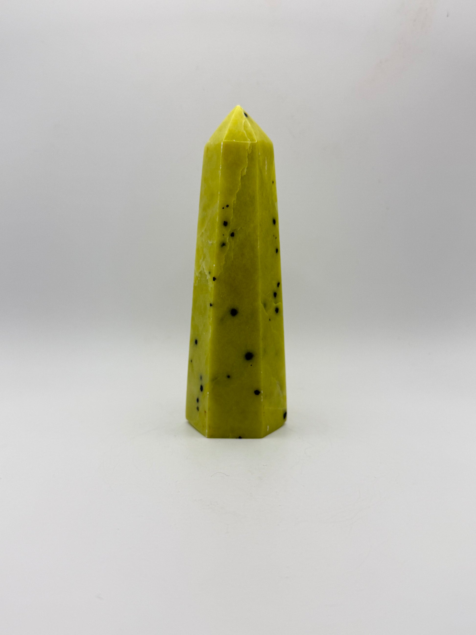Polished healerite six sided tower.