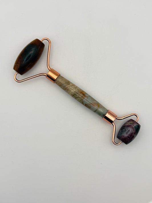 Massage roller made from ocean jasper stone.