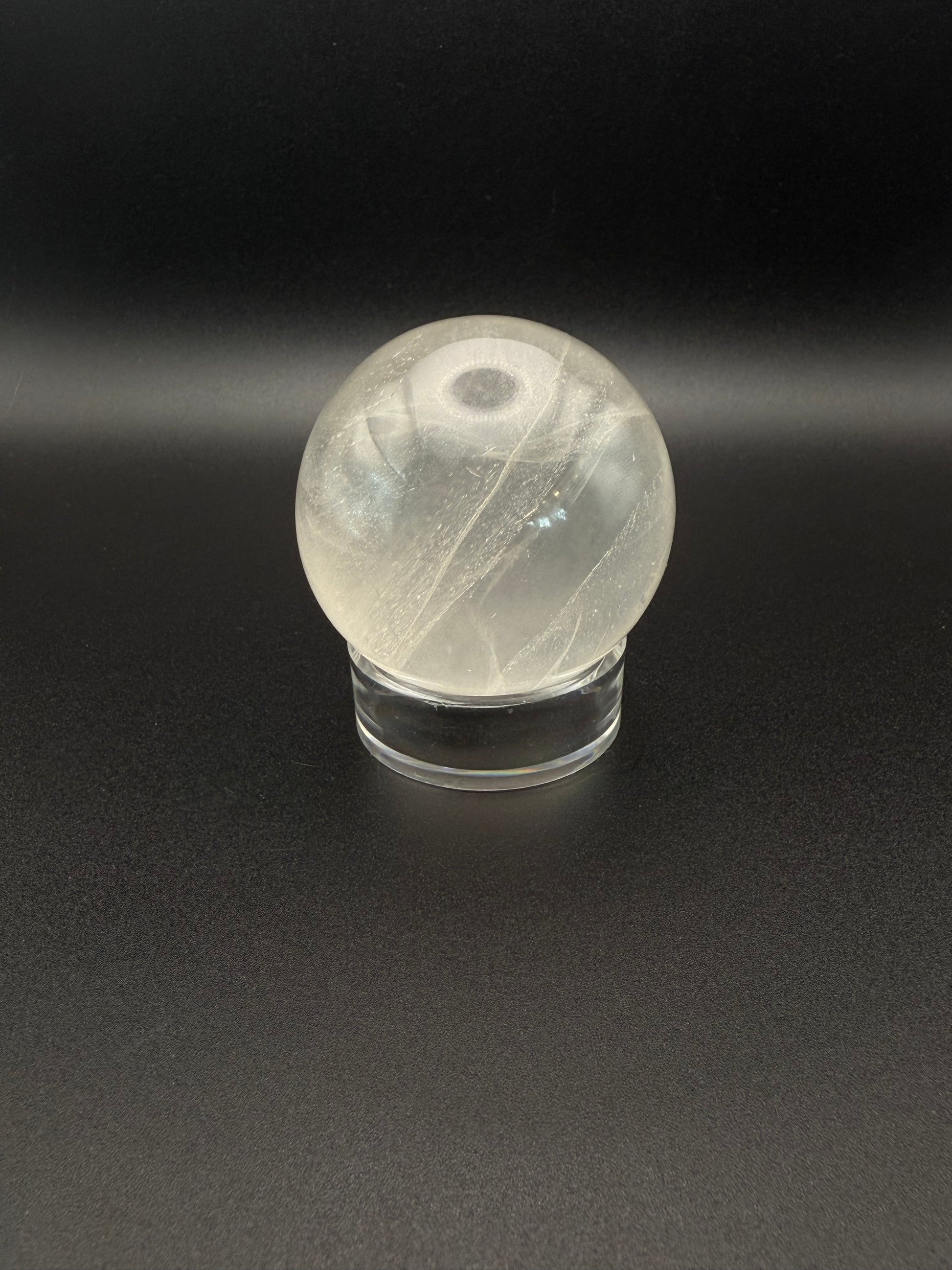 Clear quartz polished crystal sphere.