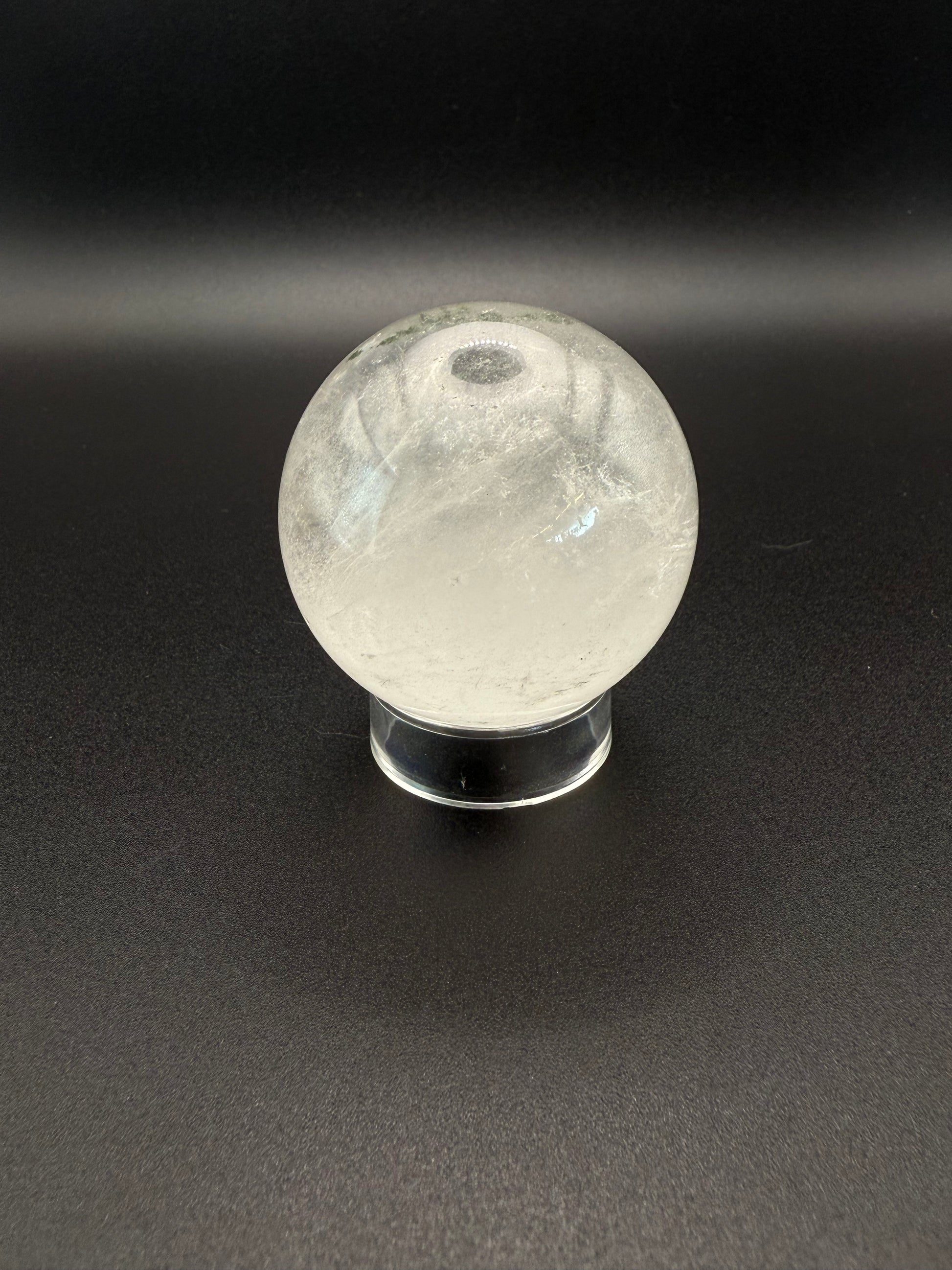 Clear quartz polished crystal sphere.