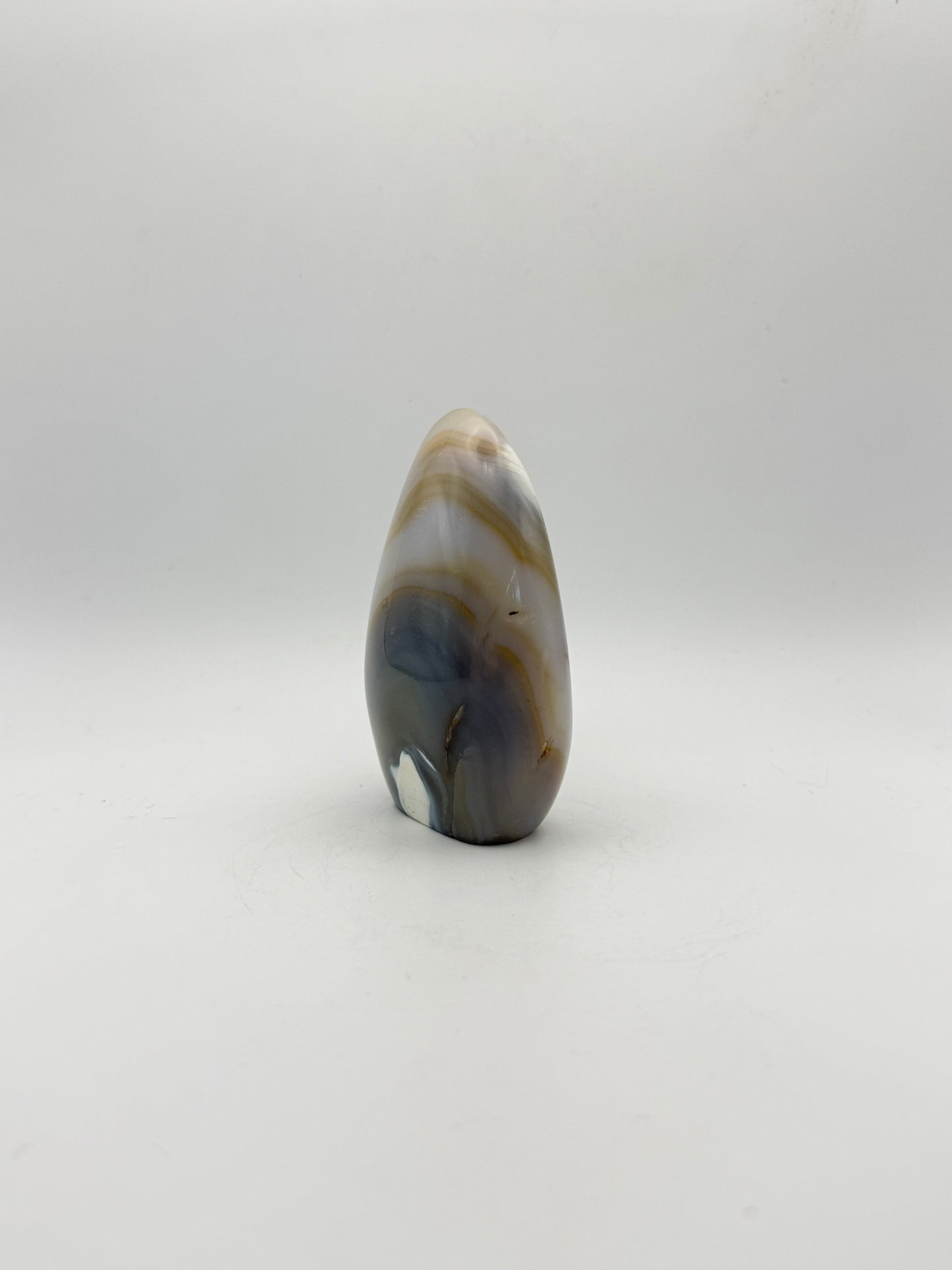 Polished orca agate free form.