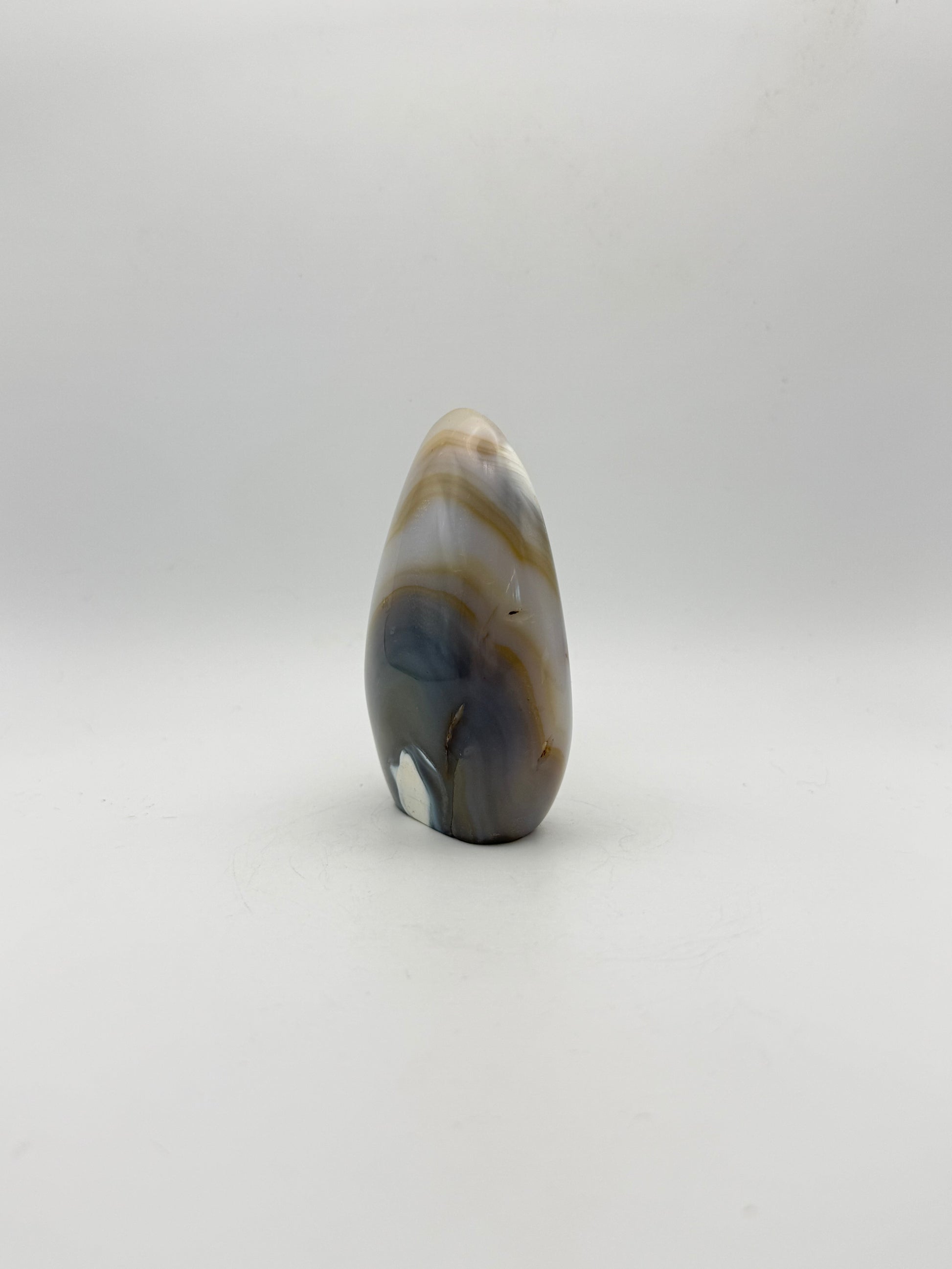 Polished orca agate free form.