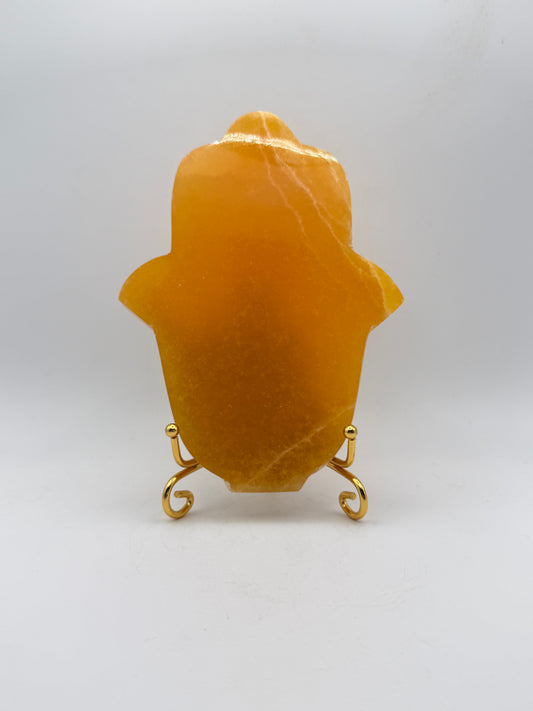 Polished Orange calcite hasma carving.
