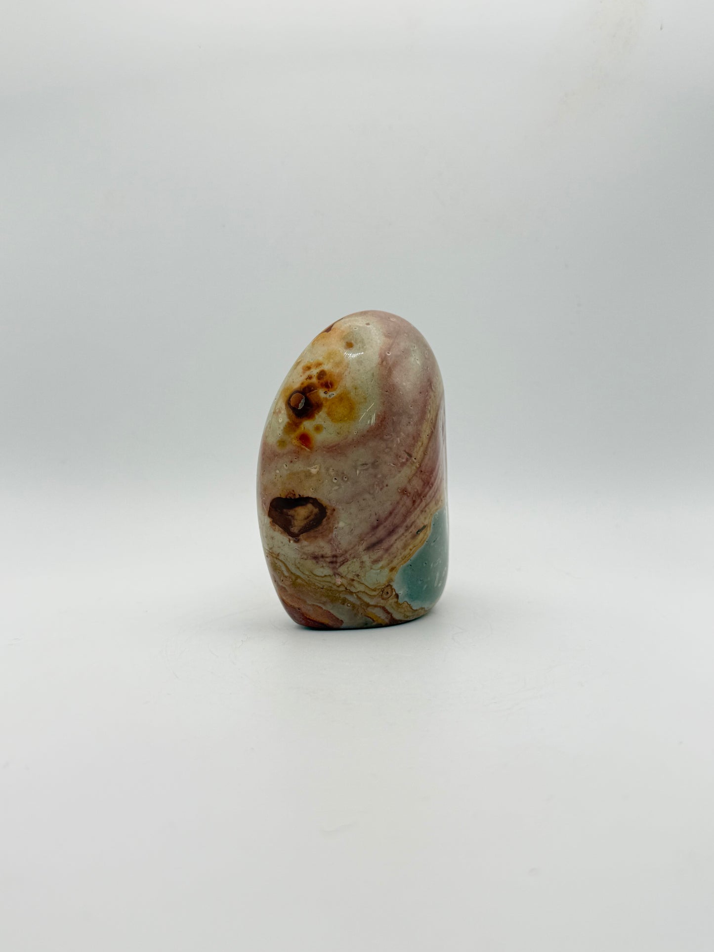 A polished polychrome jasper free from.