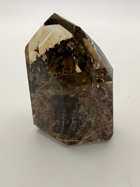 Polished natural citrine point.
