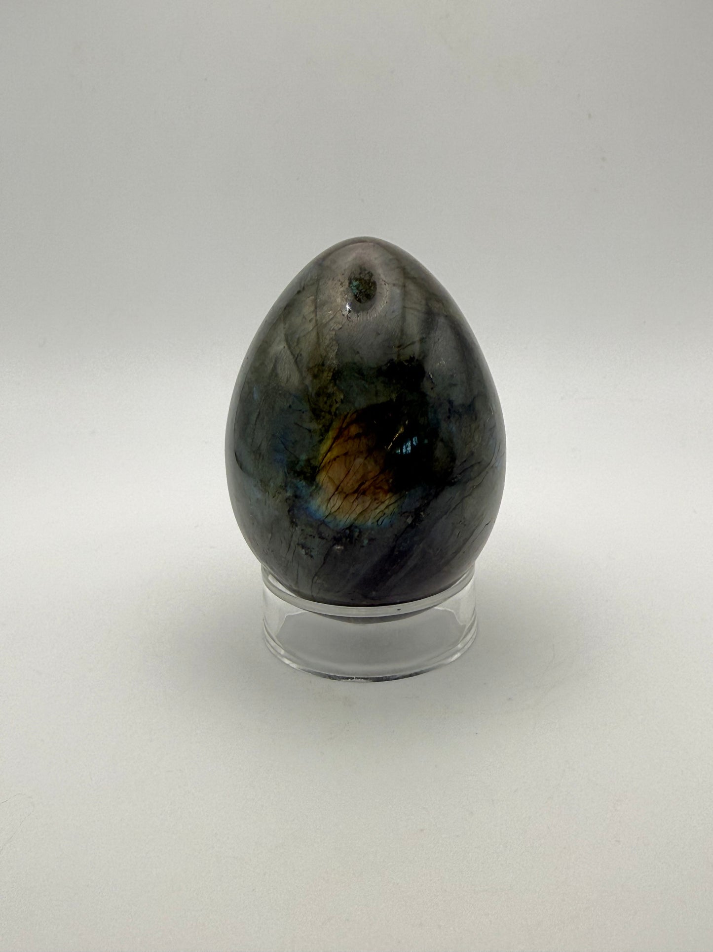 Labradorite polished stone in the shape of an egg.