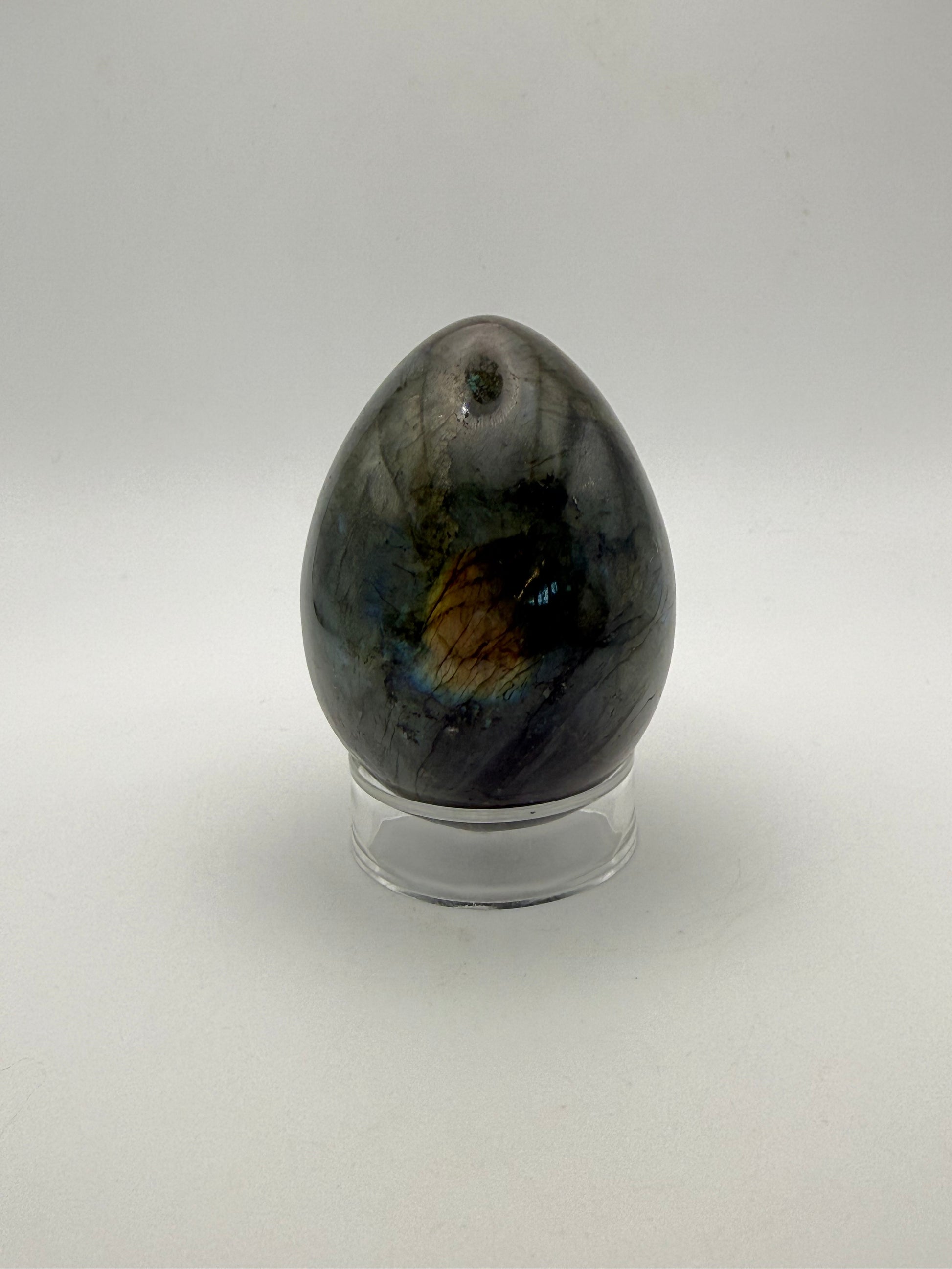 Labradorite polished stone in the shape of an egg.