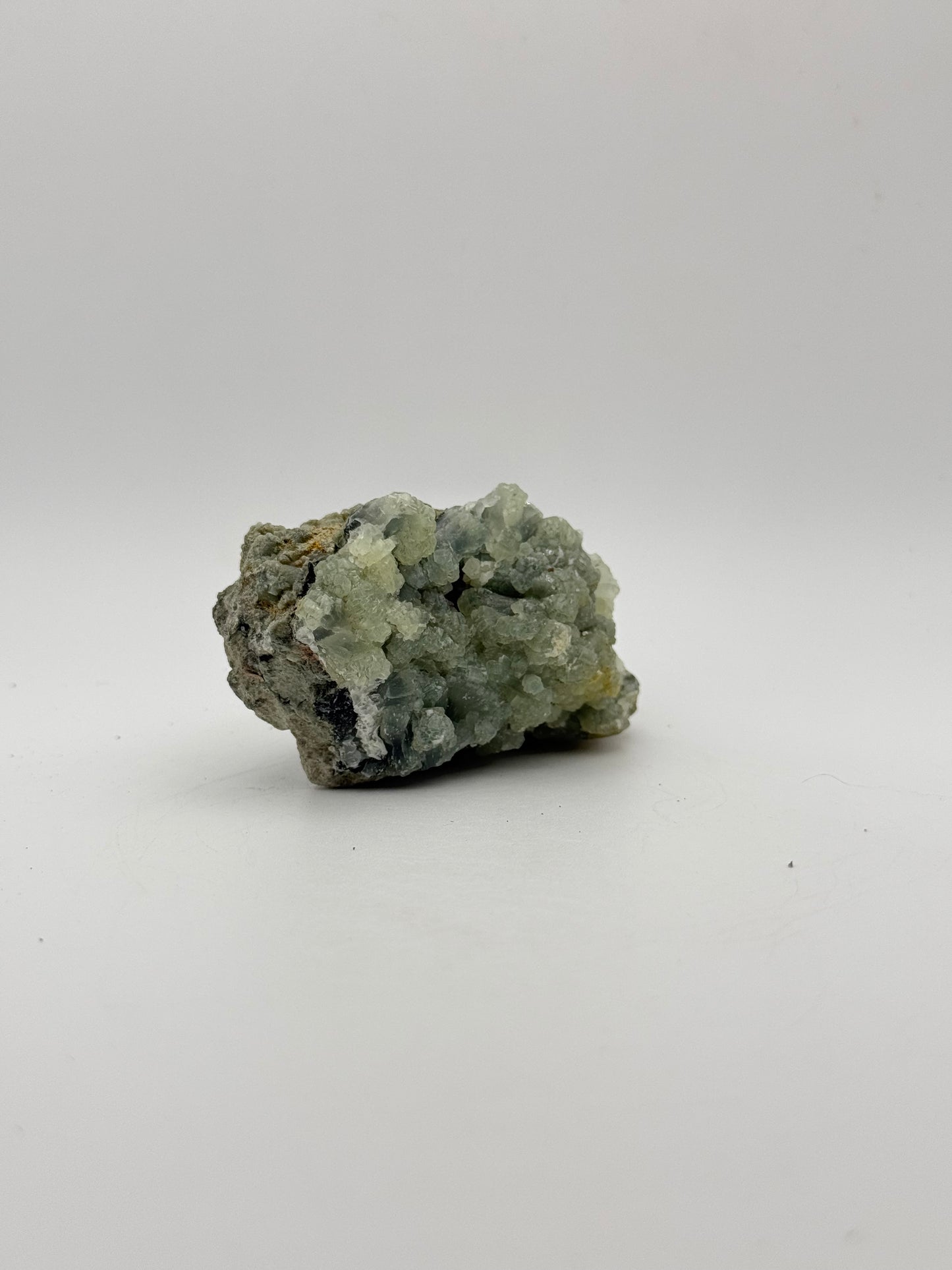 Raw prehnite specimen with amazing green color.