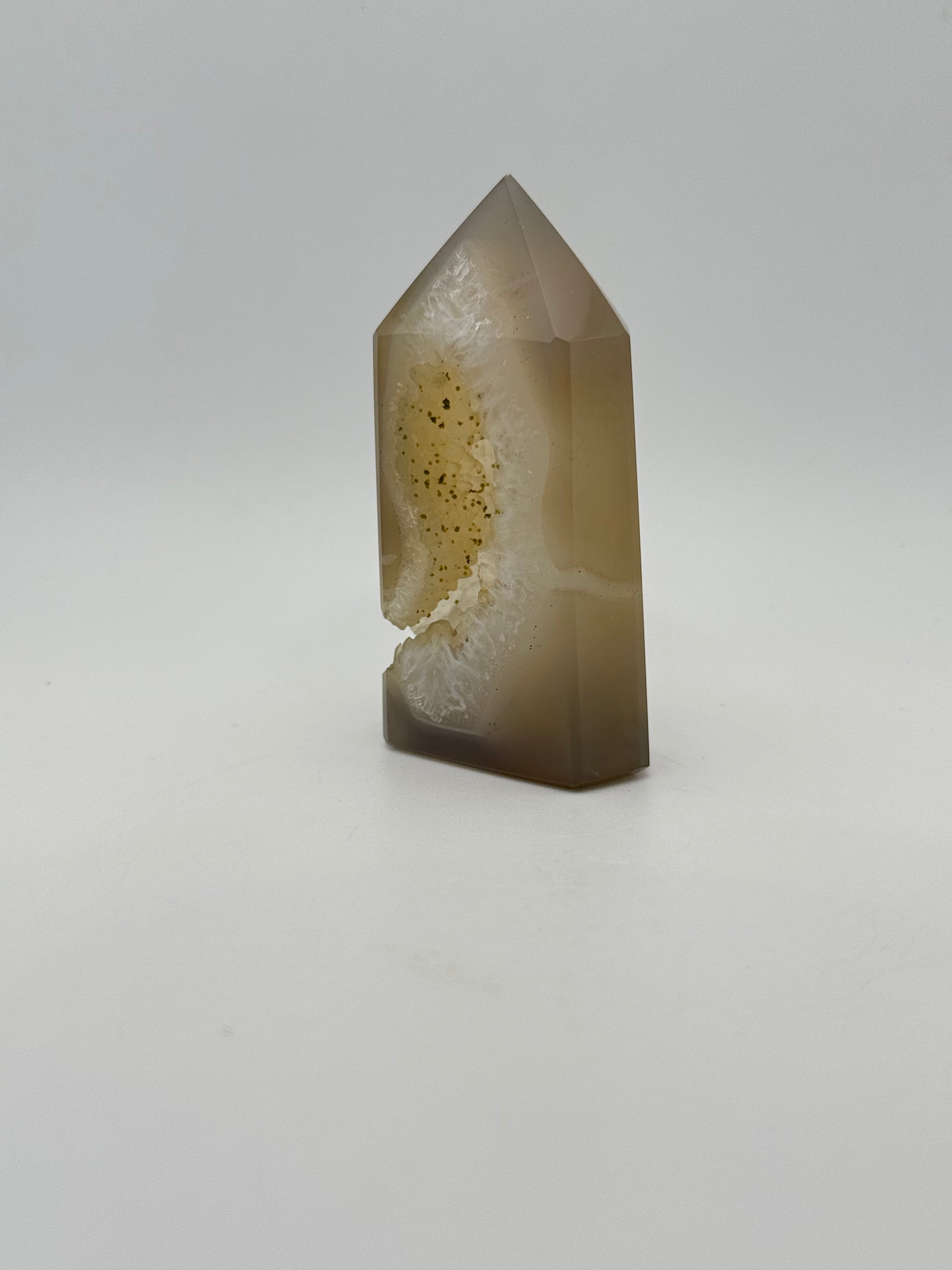 Polished druzy agate tower. About 3  inches tall.