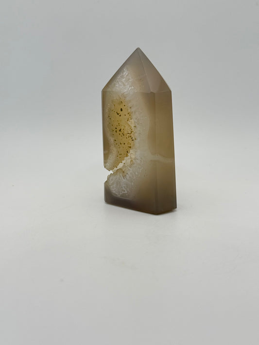 Polished druzy agate tower. About 3  inches tall.