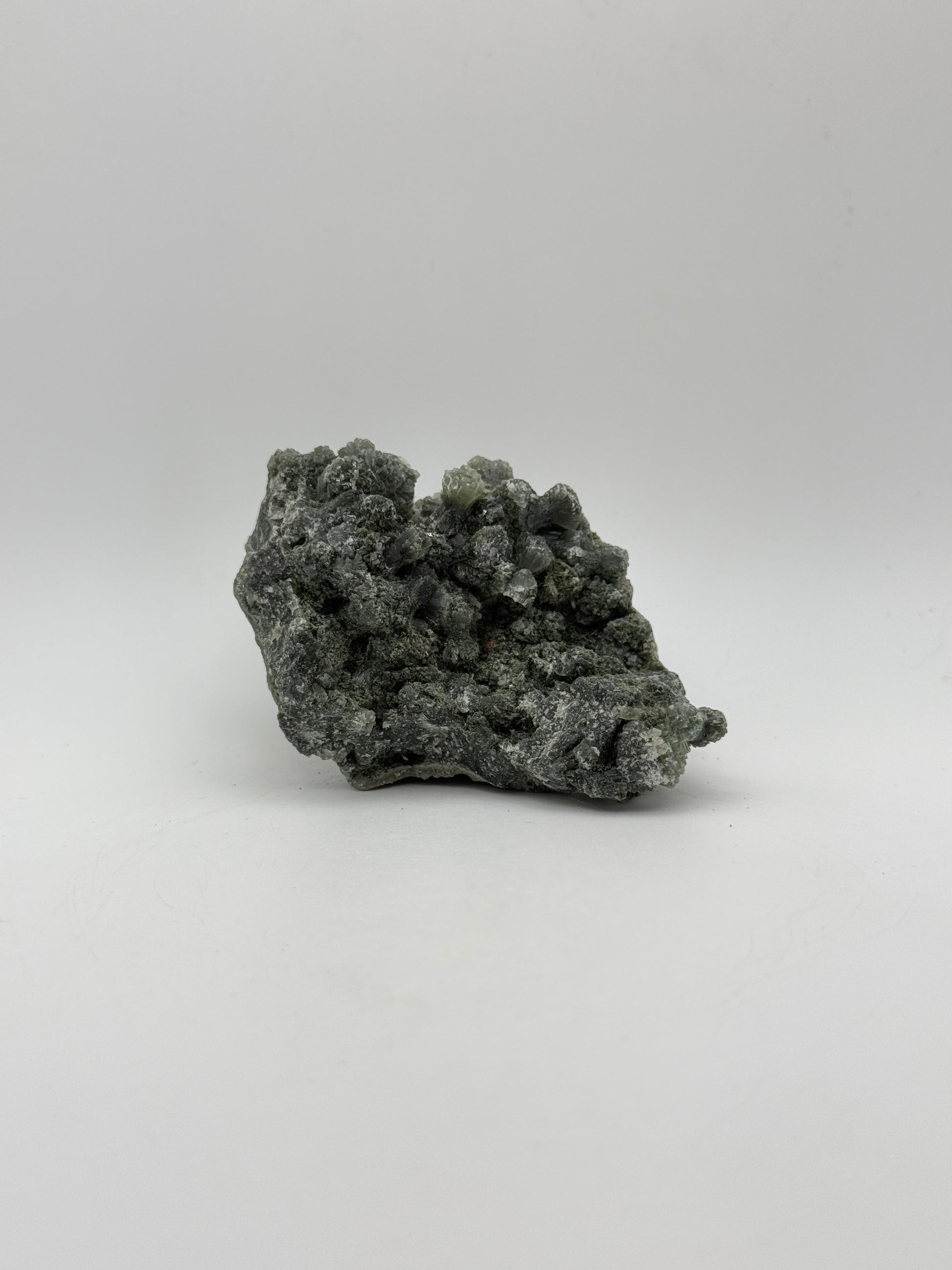 Raw prehnite specimen with amazing green color.