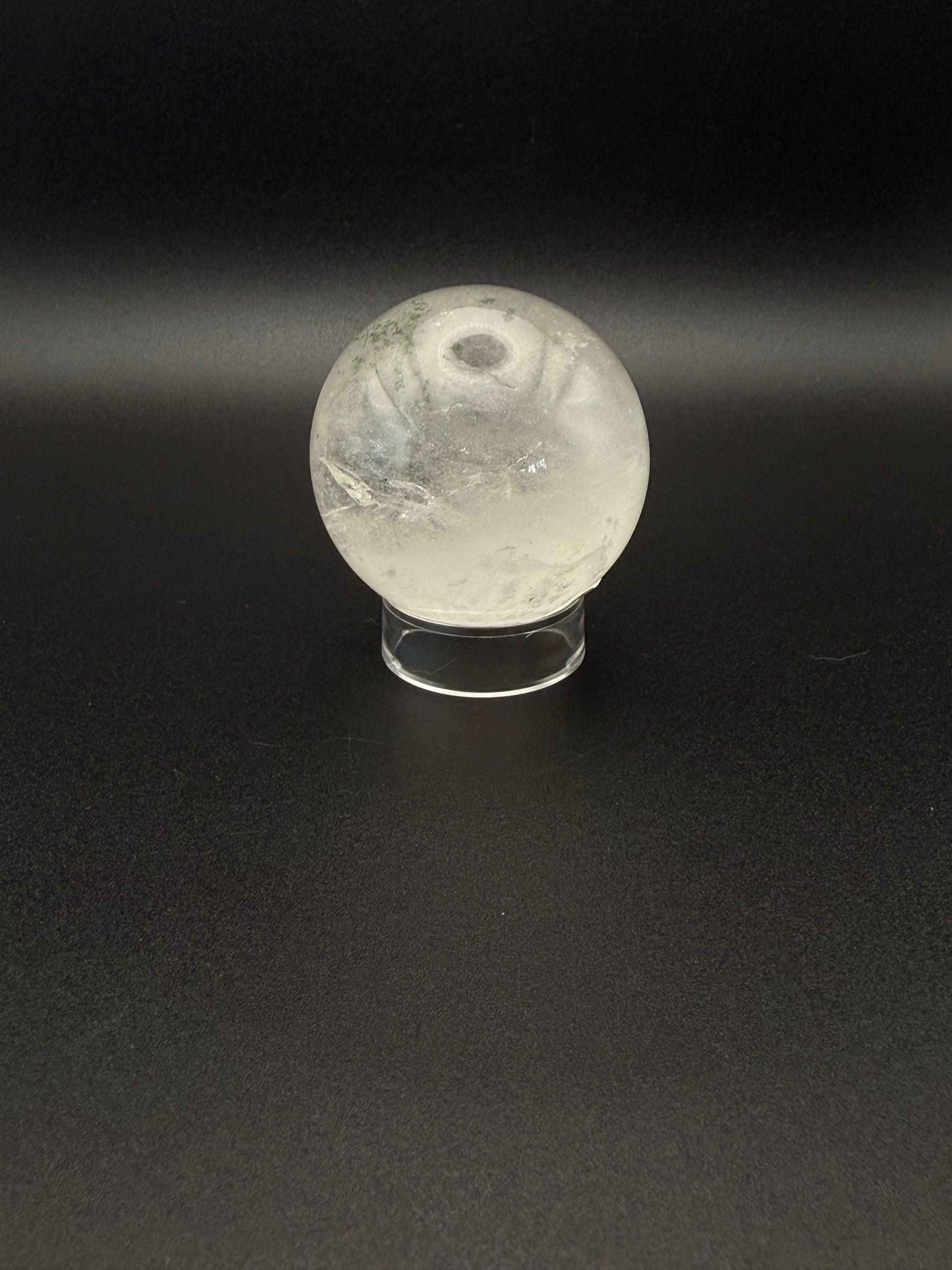 Clear quartz polished crystal sphere.