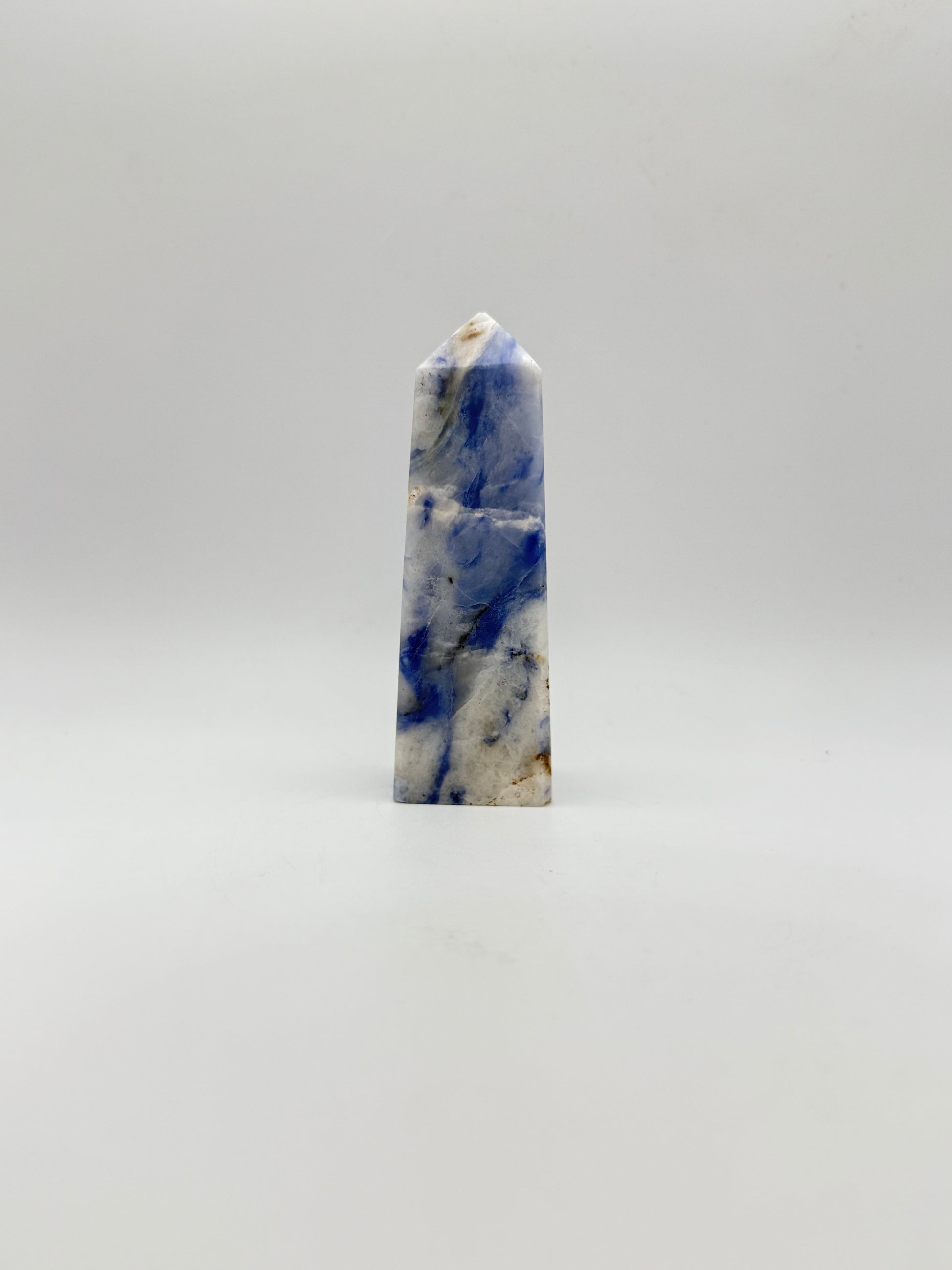 Afghanite four sided tower. Height of 3 5/8 inches, width of 1 1/8 inches.