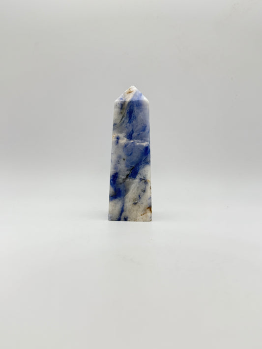 Afghanite four sided tower. Height of 3 5/8 inches, width of 1 1/8 inches.