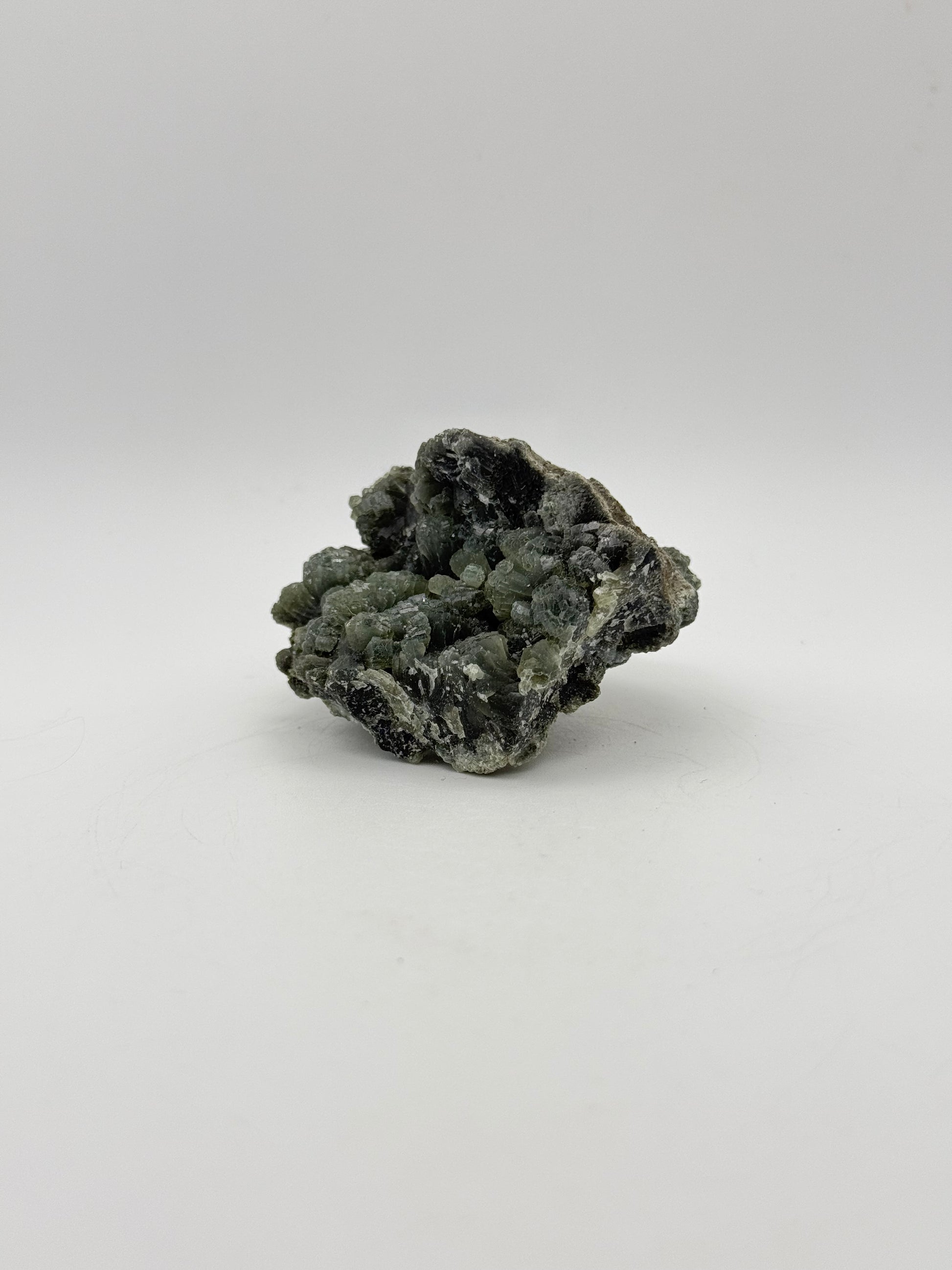 Raw prehnite specimen with amazing green color.