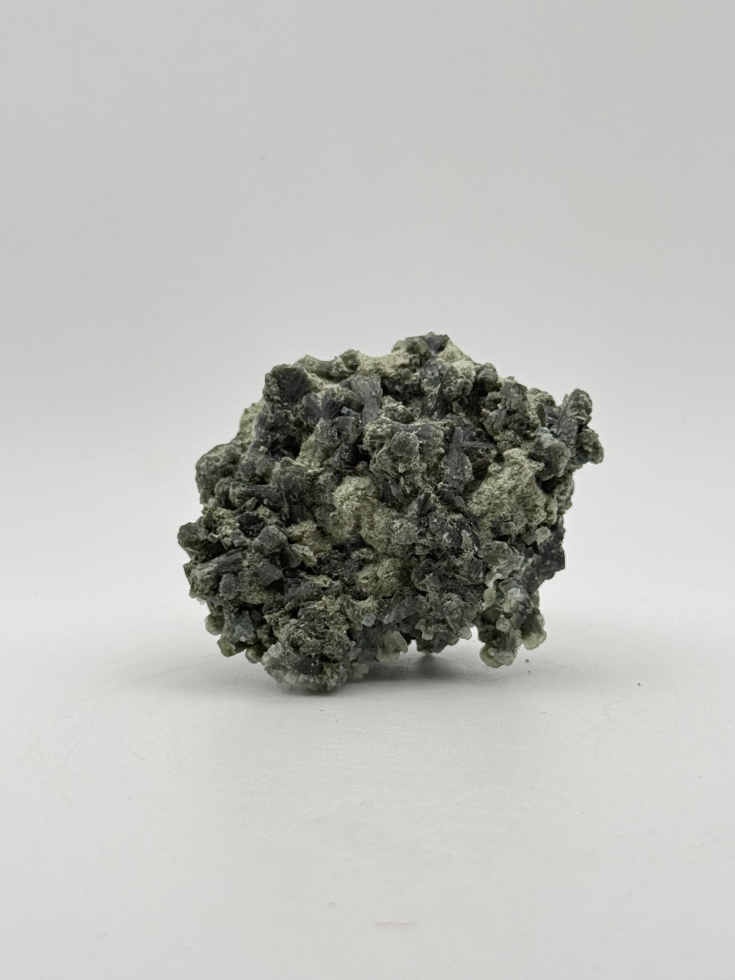 Raw prehnite specimen with amazing green color.