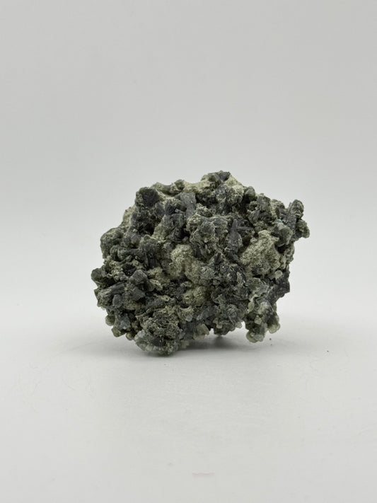 Raw prehnite specimen with amazing green color.