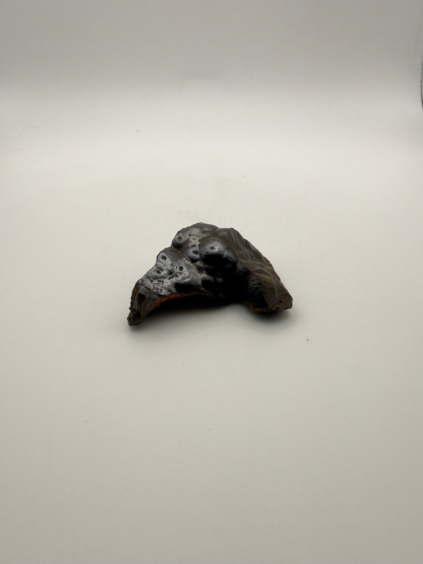 Small raw hematite specimen.
