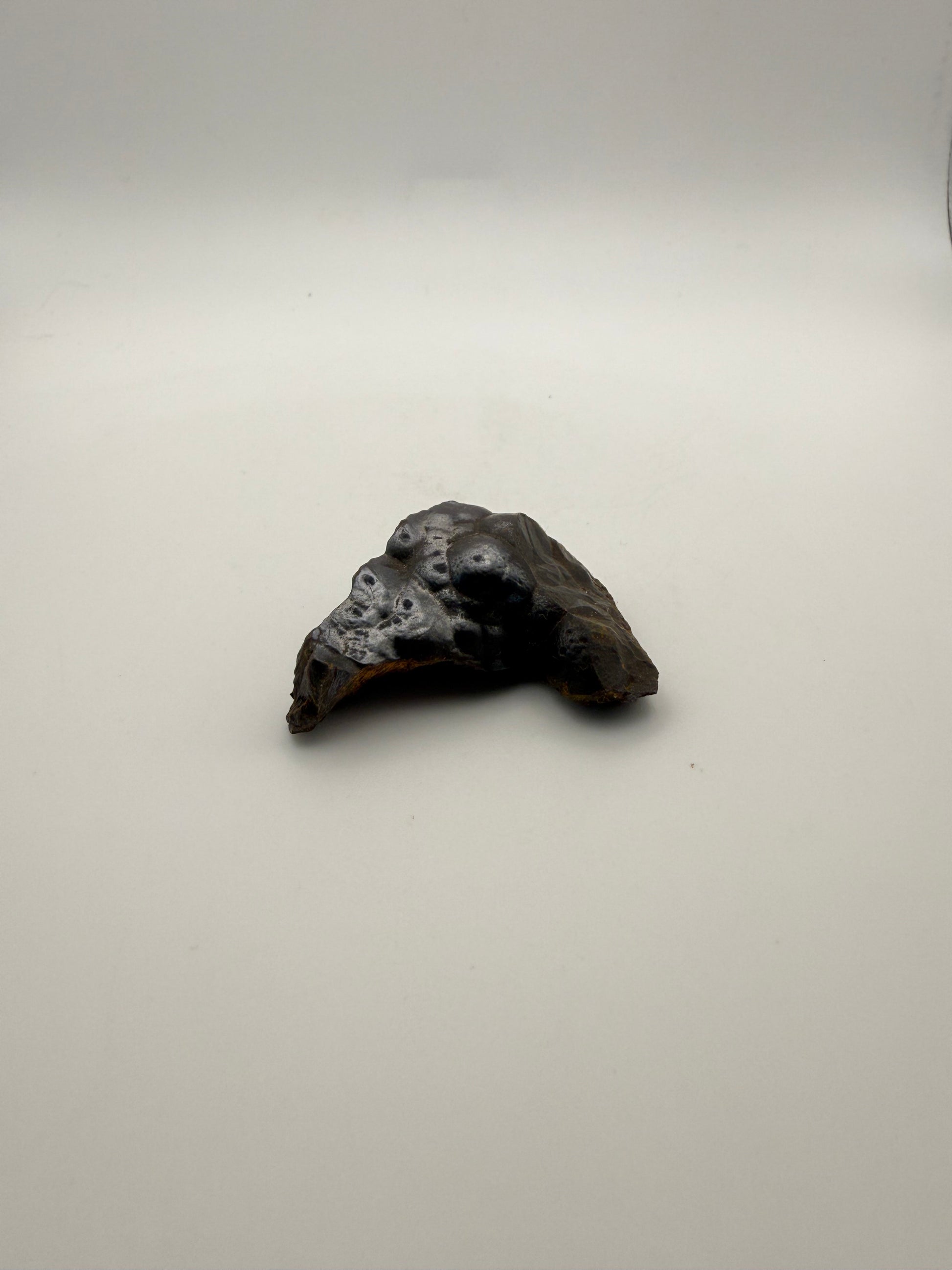 Small raw hematite specimen.