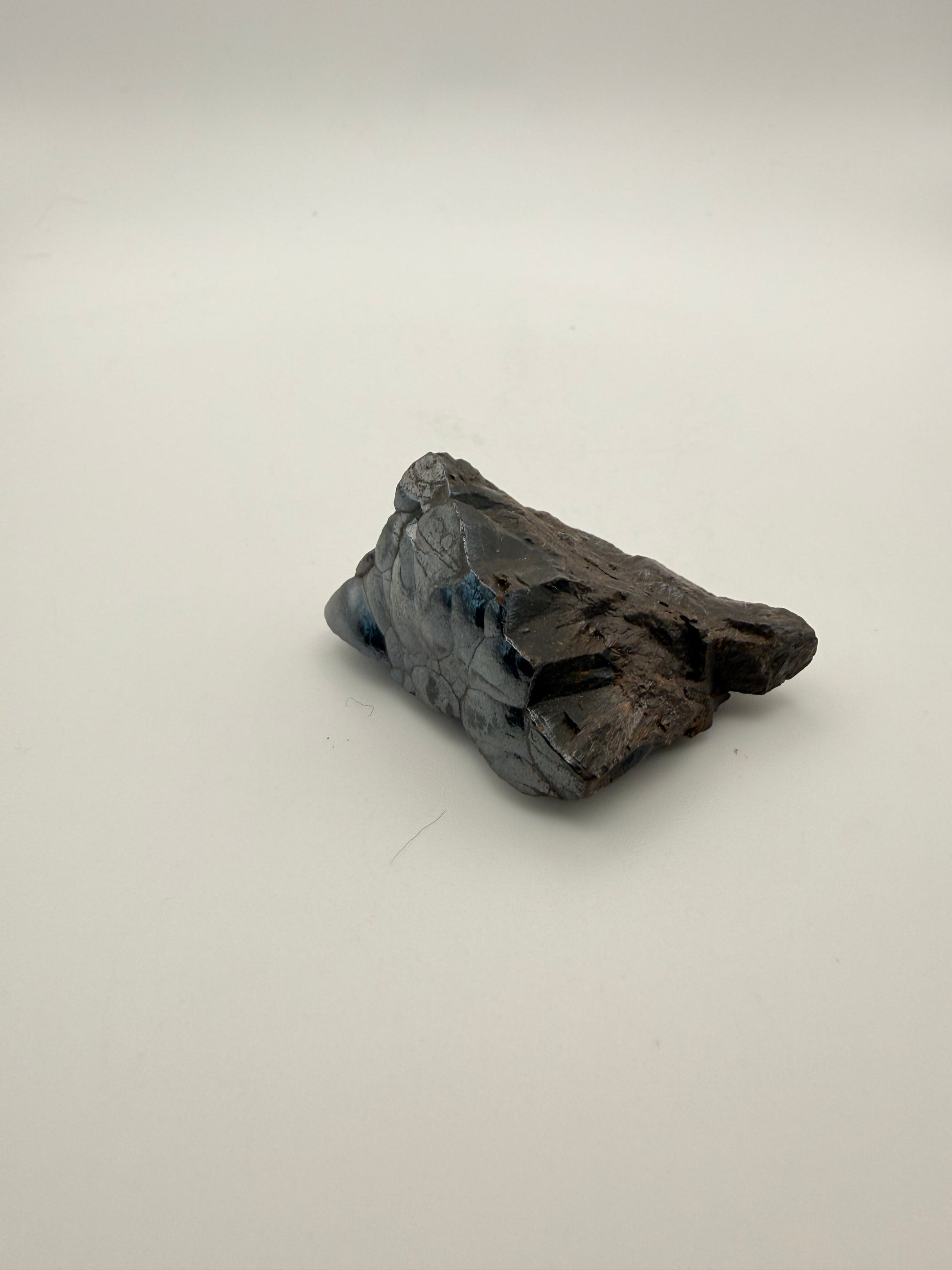 Small raw hematite specimen.