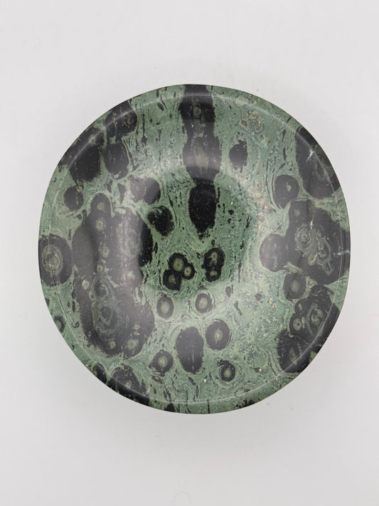 Polished kambaba jasper in the shape of a bowl.