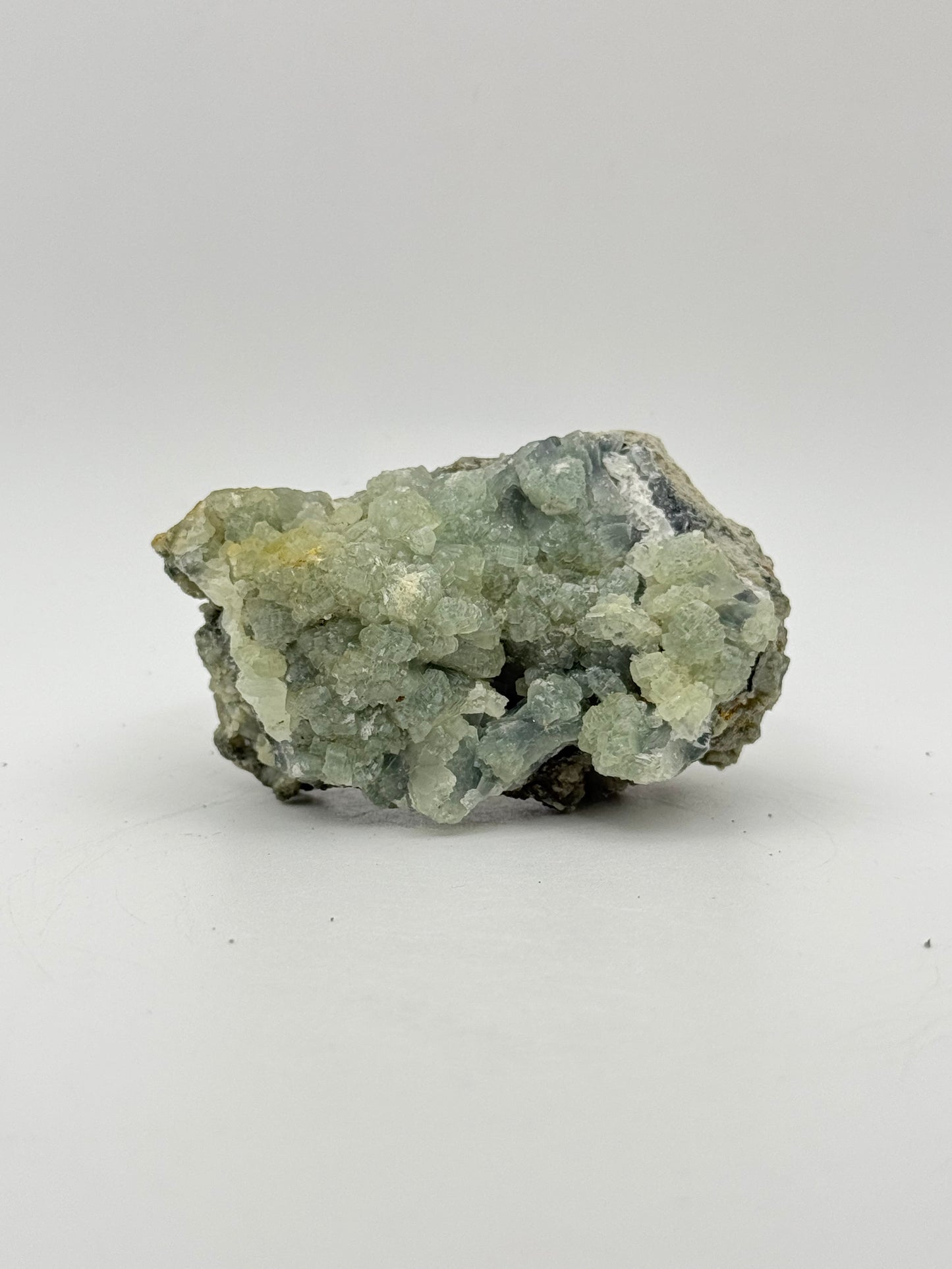 Raw prehnite specimen with amazing green color.