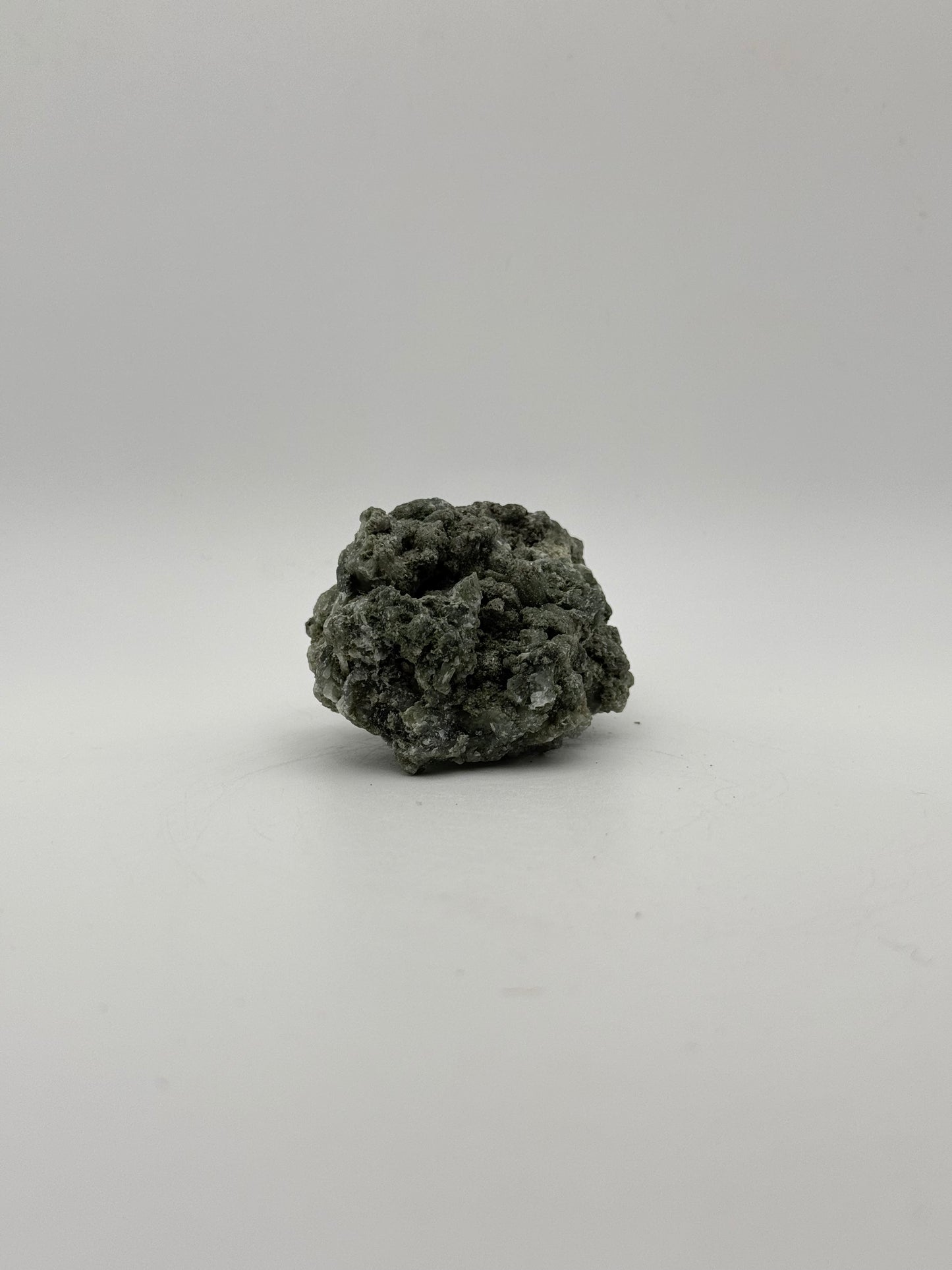 Raw prehnite specimen with amazing green color.