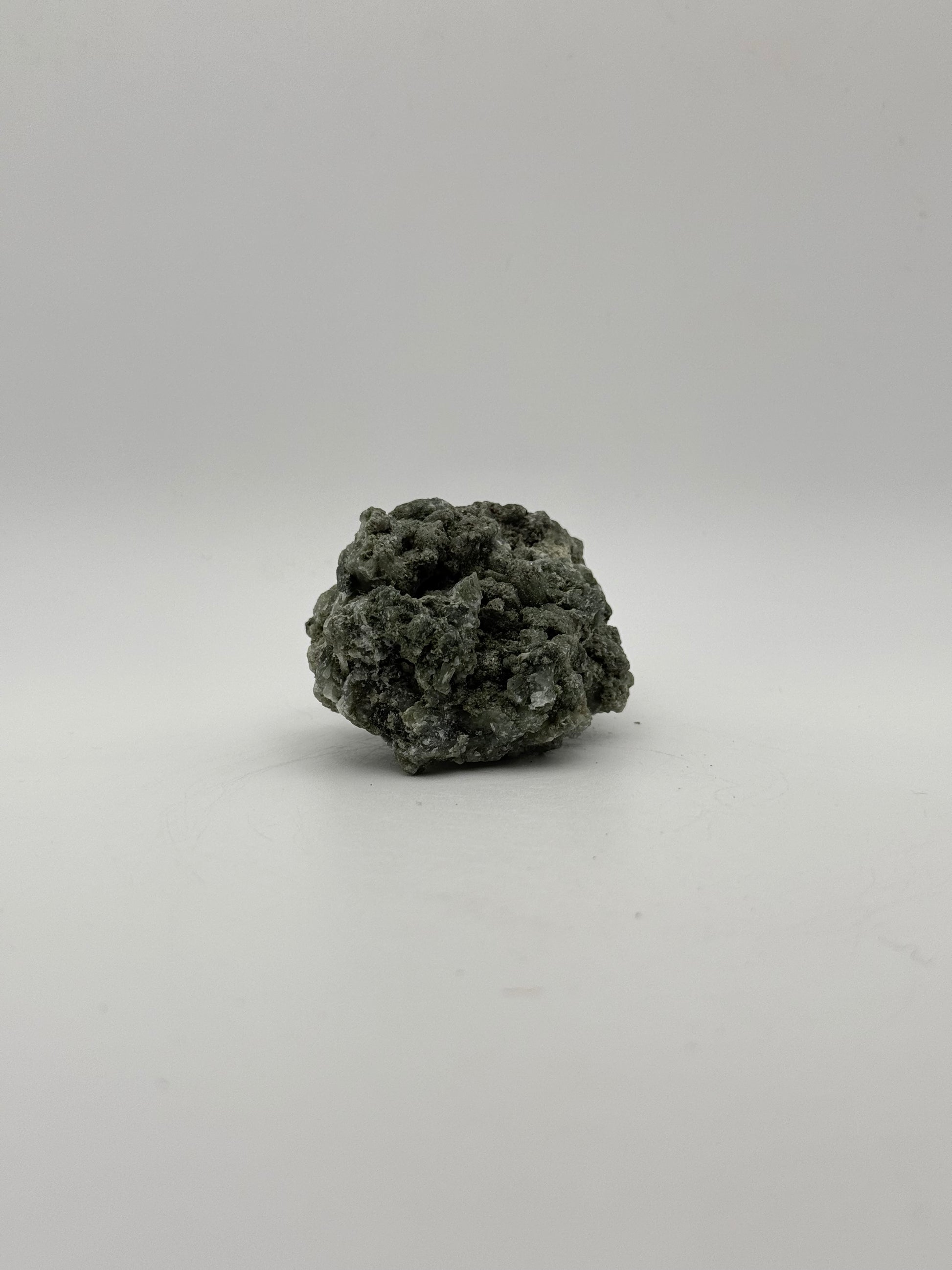 Raw prehnite specimen with amazing green color.