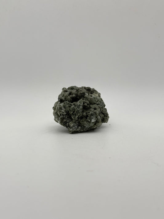 Raw prehnite specimen with amazing green color.