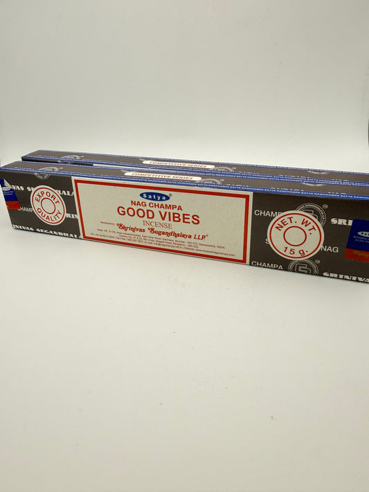 Box of incense sticks with 'Good Vibes' text on a white background
