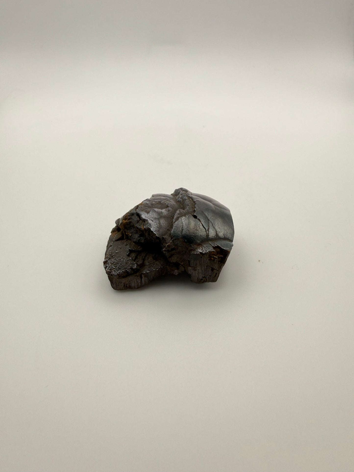 Small raw hematite specimen.