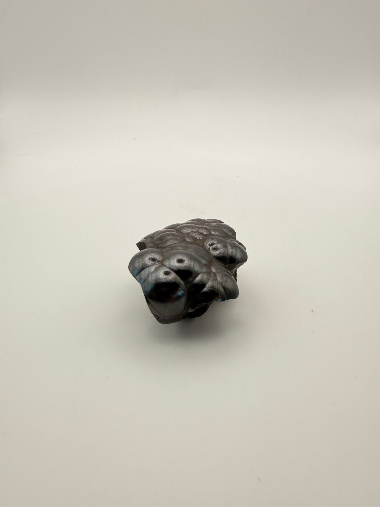 Small raw hematite specimen.