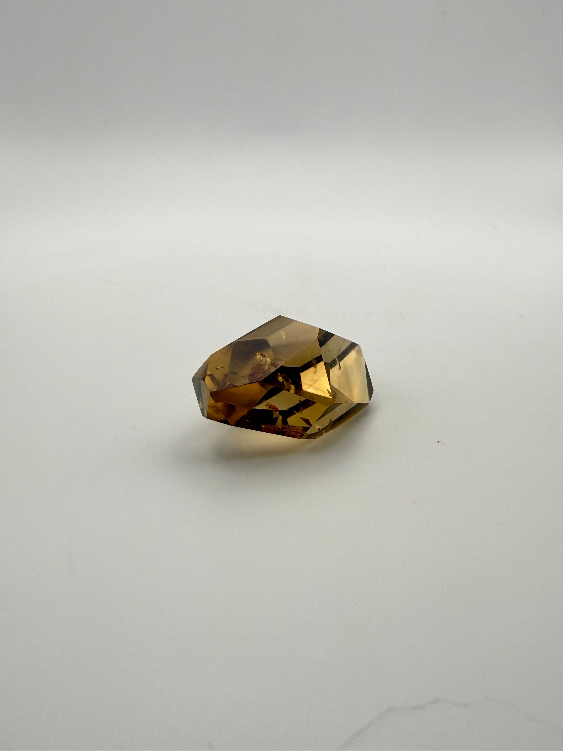 Polished natural citrine point.