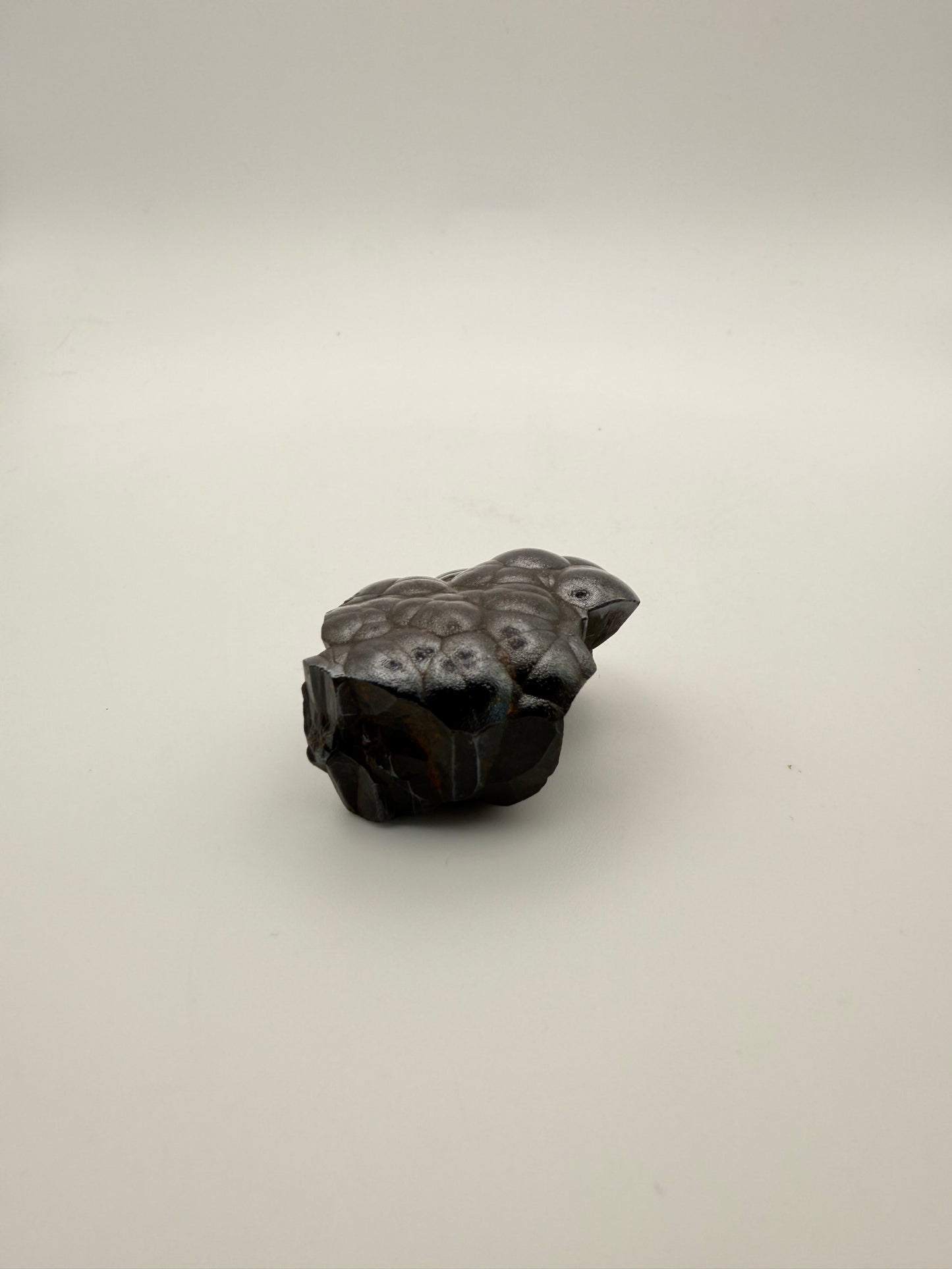 Small raw hematite specimen.