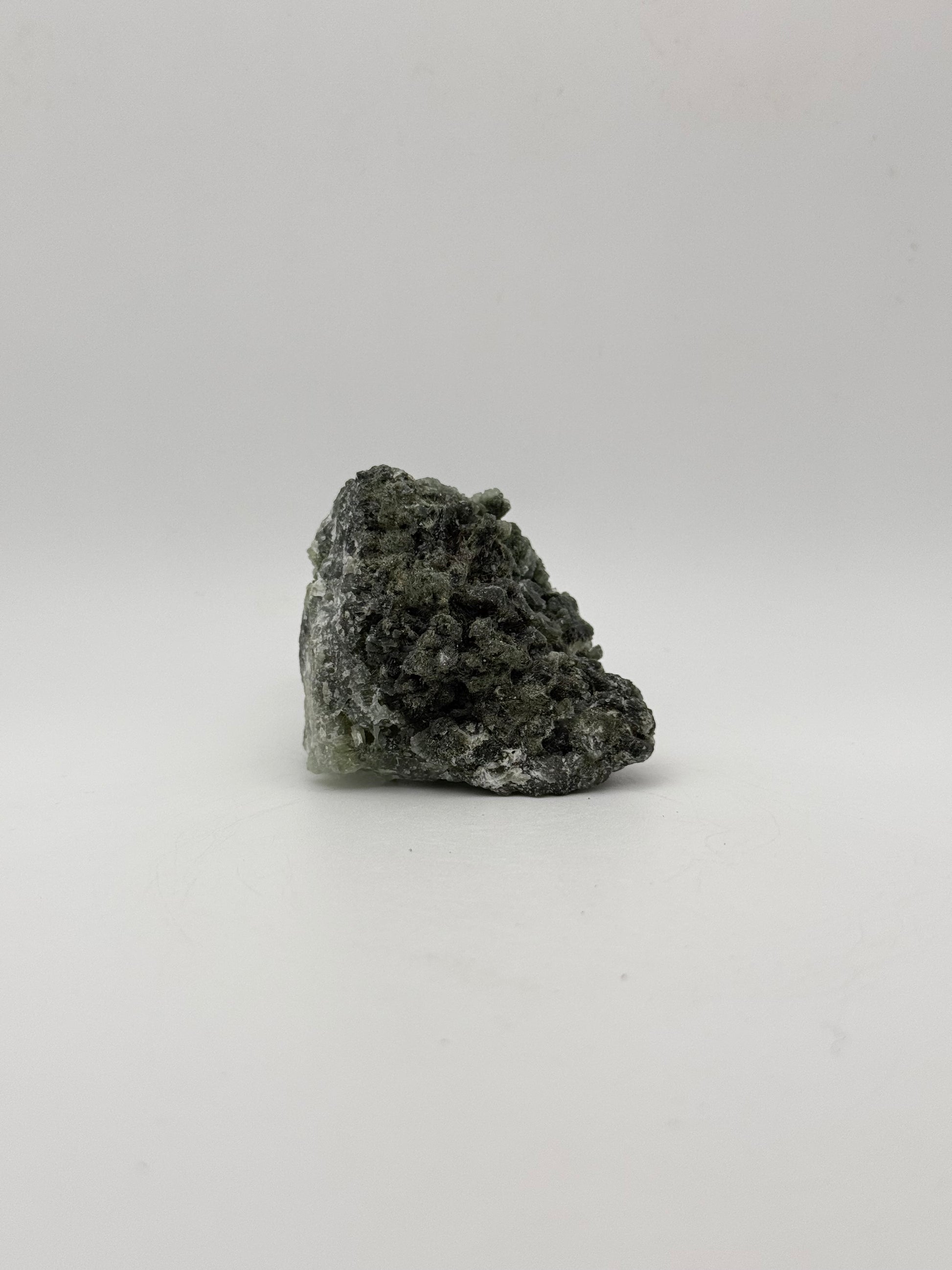 Raw prehnite specimen with amazing green color.