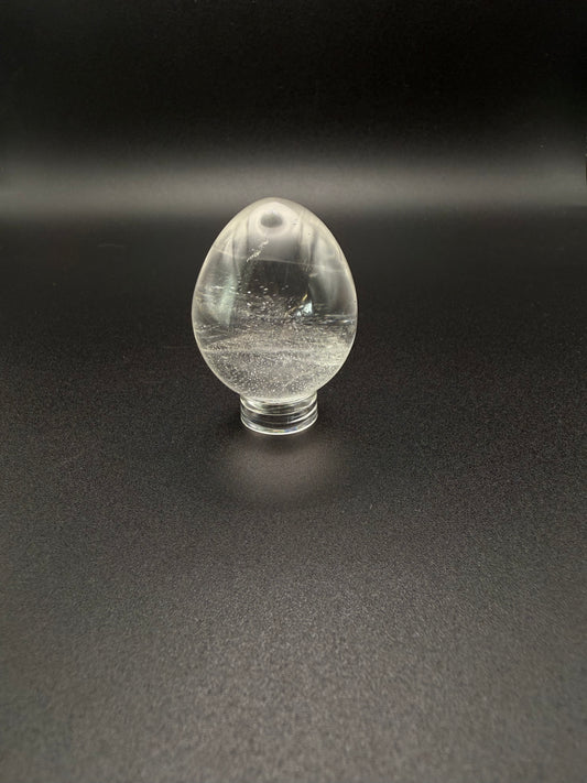 Clear quartz polished crystal in the shape of an egg.