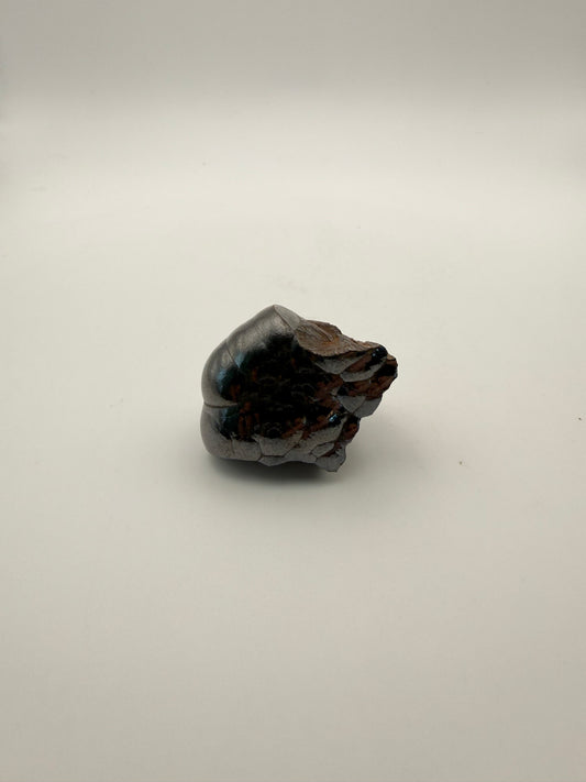 Small raw hematite specimen.