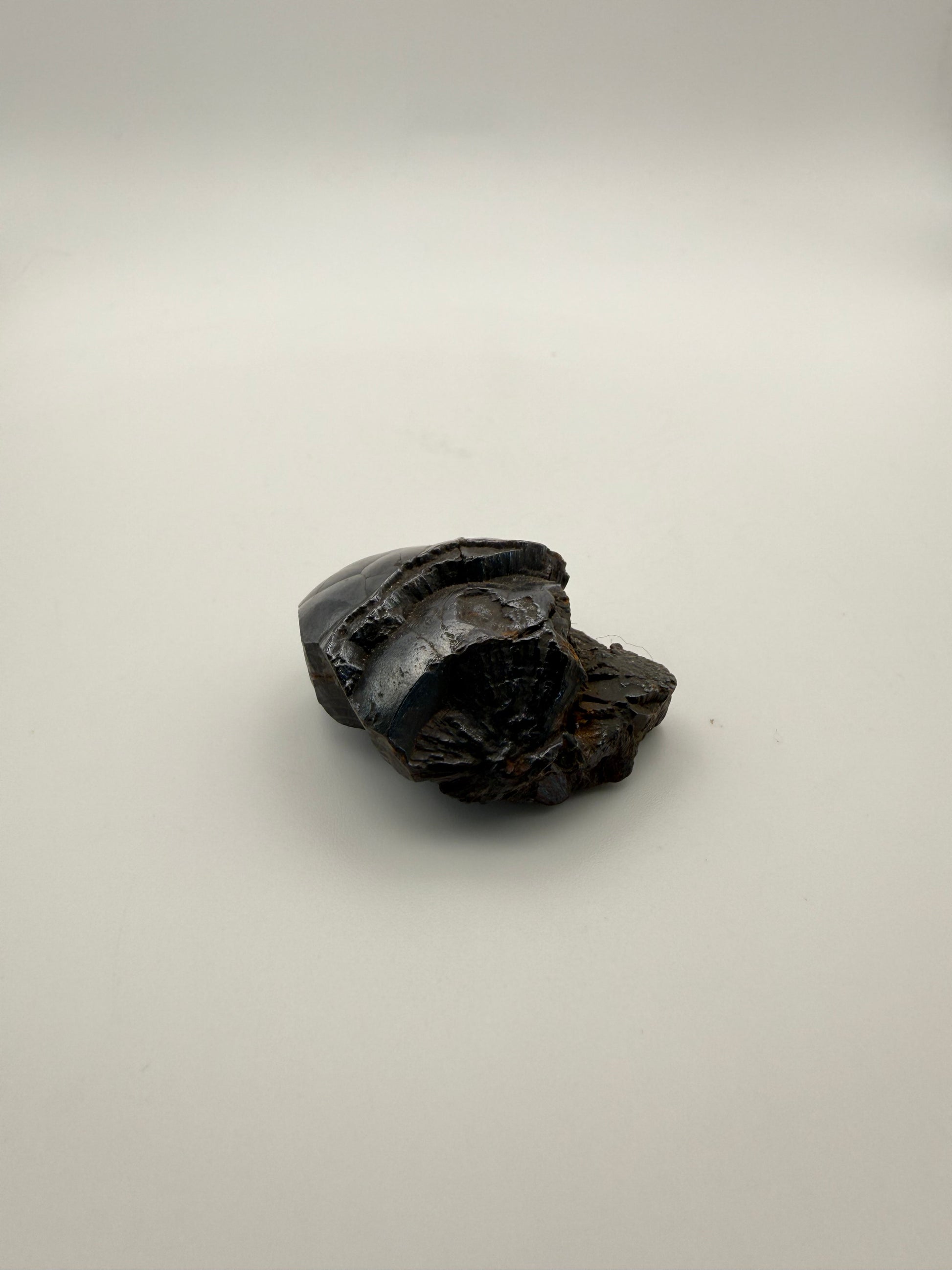 Small raw hematite specimen.