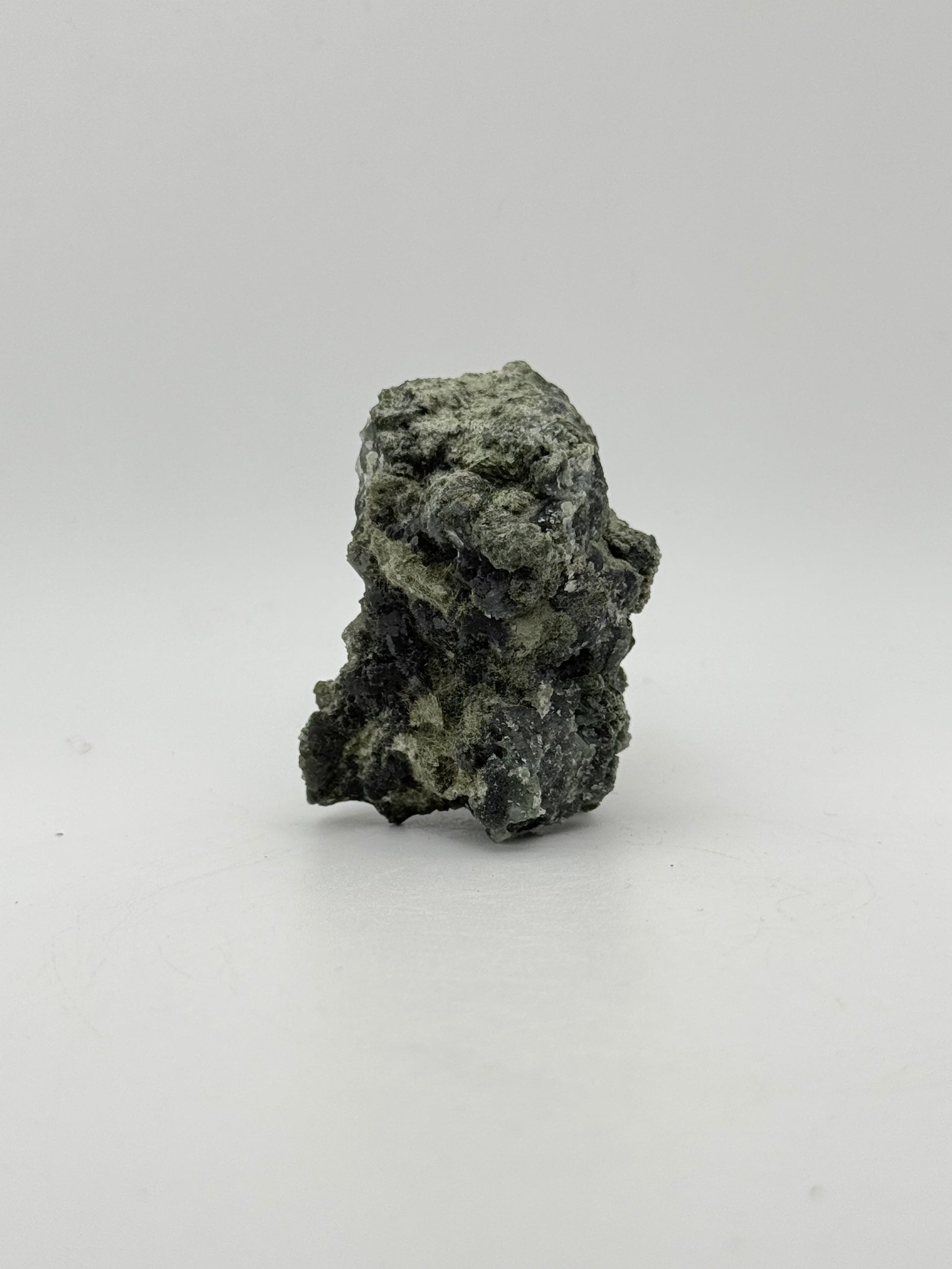 Raw prehnite specimen with amazing green color.