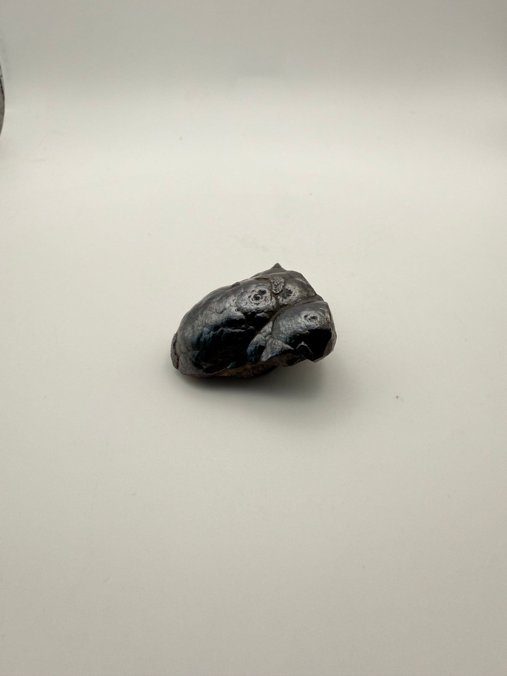 Small raw hematite specimen.