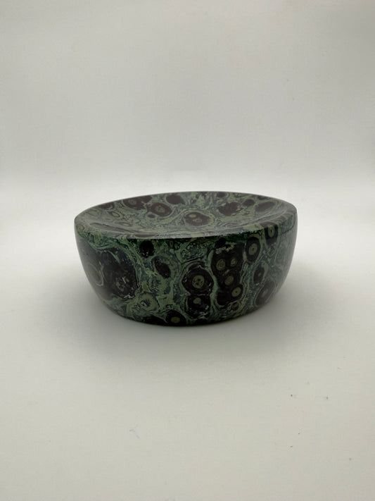 Polished kambaba jasper in the shape of a bowl.