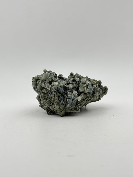 Raw prehnite specimen with amazing green color.