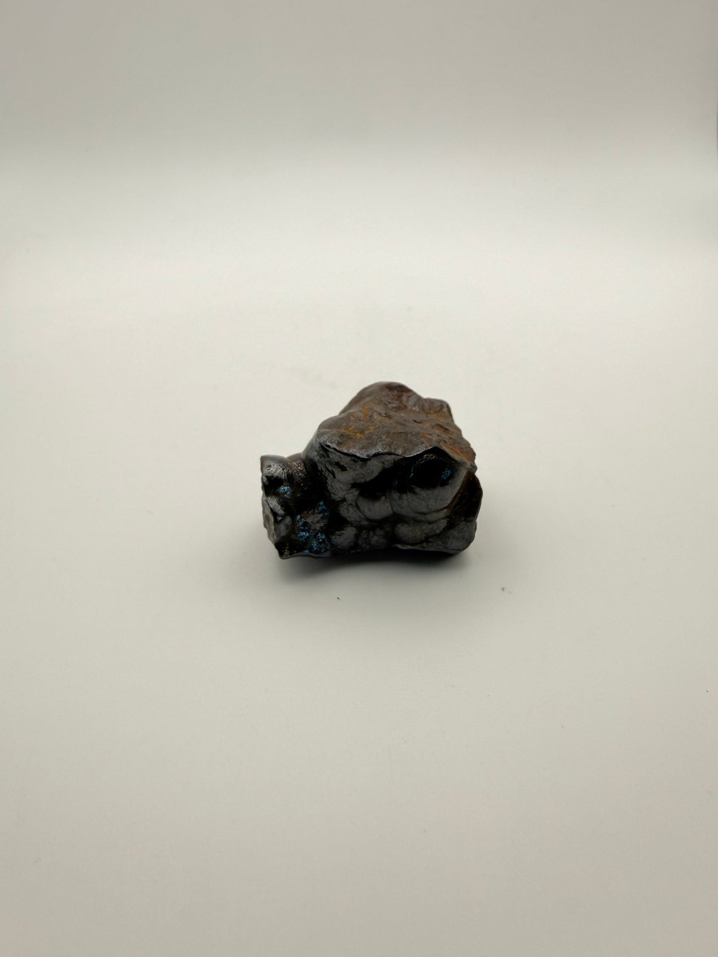 Small raw hematite specimen.