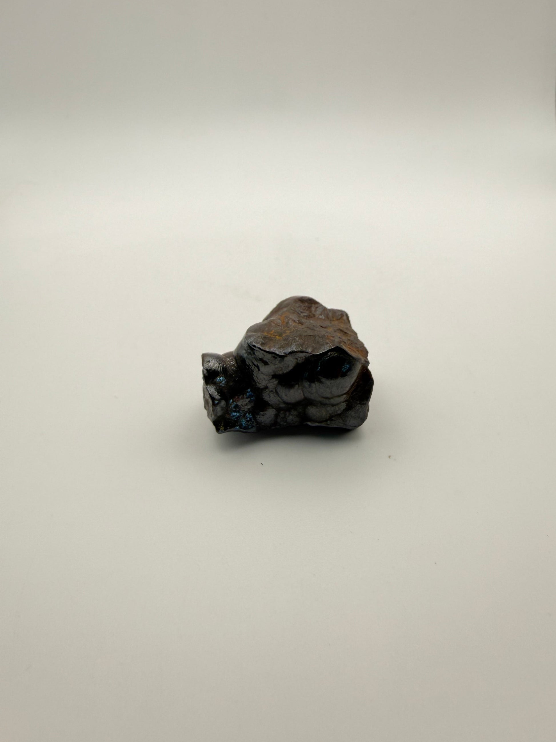 Small raw hematite specimen.